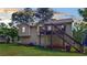 Rear view of the home showcasing back deck, and outdoor space at 310 Willow Ln, Temple, GA 30179