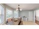 Bright dining area with natural light and views of the outdoor surroundings at 310 Willow Ln, Temple, GA 30179