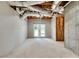 Unfinished basement with walkout to backyard and potential for customization at 1226 Kelly Nelson Ct, Lawrenceville, GA 30043