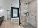 Luxurious bathroom with marble shower, soaking tub, and dual vanity at 1226 Kelly Nelson Ct, Lawrenceville, GA 30043