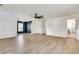 An open bonus room with light flooring and a stylish navy accent wall at 1226 Kelly Nelson Ct, Lawrenceville, GA 30043