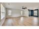 Large, open bonus room with luxury vinyl floors and plenty of windows at 1226 Kelly Nelson Ct, Lawrenceville, GA 30043