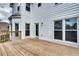 Large wooden deck extending from the home, providing space for relaxation and outdoor activities at 1226 Kelly Nelson Ct, Lawrenceville, GA 30043