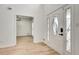Bright entryway with soaring ceiling, light wood floors and decorative glass front door at 1226 Kelly Nelson Ct, Lawrenceville, GA 30043