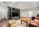 Spacious finished basement with built-in shelving, seating, and exterior access at 1691 Houghton N Ct, Atlanta, GA 30338