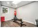 Basement features gym equipment and natural light at 1691 Houghton N Ct, Atlanta, GA 30338