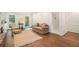 Comfortable living room with hardwood floors, area rug and a sofa at 1691 Houghton N Ct, Atlanta, GA 30338