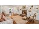 Comfortable living room with a fireplace, built-in shelving and a sofa at 1691 Houghton N Ct, Atlanta, GA 30338