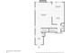 Main floor plan featuring a kitchen, dining room, living room, bathroom, and foyer at 3401 Village Green Dr, Roswell, GA 30075