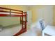 Bedroom with bunkbeds, closet space, and a desk at 508 Keeneland Ave, Woodstock, GA 30189