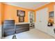 A secondary bedroom featuring decor, neutral carpet, and built-in storage solutions at 508 Keeneland Ave, Woodstock, GA 30189