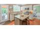 Bright kitchen featuring granite countertops and stainless steel appliances at 508 Keeneland Ave, Woodstock, GA 30189
