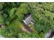 A beautiful property with lush greenery and mature trees surrounding the home at 348 7Th Ne St, Atlanta, GA 30308