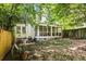 A lovely home with backyard that features a screened porch and mature trees at 348 7Th Ne St, Atlanta, GA 30308