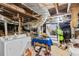 Unfinished basement features a washer and dryer and is well lit, ready for your design ideas at 348 7Th Ne St, Atlanta, GA 30308