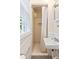Bathroom featuring a shower with a white shower curtain and a toilet and sink at 348 7Th Ne St, Atlanta, GA 30308