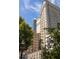 Exterior low angle view of a high-rise building showcasing architectural details and design at 348 7Th Ne St, Atlanta, GA 30308
