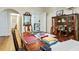 Cozy dining room with hardwood floors, antique furniture, and easy access to the kitchen area at 348 7Th Ne St, Atlanta, GA 30308