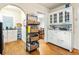 Bright kitchen with hardwood floors, white cabinetry, and ample counter space for food preparation at 348 7Th Ne St, Atlanta, GA 30308