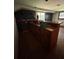 Finished basement with a wet bar featuring custom wood cabinetry at 4819 Coppedge Trl, Peachtree Corners, GA 30096