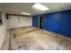 Unfinished section of the basement with blue painted walls at 4819 Coppedge Trl, Peachtree Corners, GA 30096