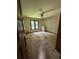 The spacious bedroom includes a window, ceiling fan, and closet, offering ample space and comfort at 4819 Coppedge Trl, Peachtree Corners, GA 30096
