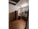 View of an empty storage closet with built-in shelving, offering ample storage possibilities at 4819 Coppedge Trl, Peachtree Corners, GA 30096