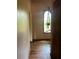 Entryway with wood floors, a decorative hanging plant, and a view to the outside at 4819 Coppedge Trl, Peachtree Corners, GA 30096