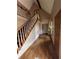 Spacious foyer featuring gleaming hardwood floors, a staircase, and ample natural light at 4819 Coppedge Trl, Peachtree Corners, GA 30096