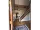 Open foyer with hardwood floors, staircase, chandelier, and views to the upstairs landing at 4819 Coppedge Trl, Peachtree Corners, GA 30096