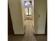 Hallway features a view of the window, enhancing the home's classic charm at 4819 Coppedge Trl, Peachtree Corners, GA 30096