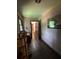 Hallway with tile flooring, soft walls, and a window with a view to the backyard at 4819 Coppedge Trl, Peachtree Corners, GA 30096