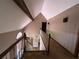 Upper hallway features neutral walls and chandelier, leading to various rooms in the home at 4819 Coppedge Trl, Peachtree Corners, GA 30096
