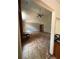 A spacious living room features a brick fireplace and a ceiling fan at 4819 Coppedge Trl, Peachtree Corners, GA 30096