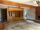 Living room with a fireplace, built-in shelving, and carpet flooring, ideal for relaxation and entertainment at 4819 Coppedge Trl, Peachtree Corners, GA 30096