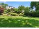 Spacious backyard featuring a well-maintained lawn and mature landscaping at 733 Greenview Ne Ave, Atlanta, GA 30305