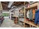 Unfinished basement space with storage, work bench and exposed ceiling at 733 Greenview Ne Ave, Atlanta, GA 30305