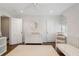 Bedroom with soft carpet, changing table, and neutral tones at 733 Greenview Ne Ave, Atlanta, GA 30305