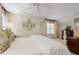Bedroom featuring a ceiling fan, carpeting, and natural light from the window at 733 Greenview Ne Ave, Atlanta, GA 30305