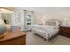 Cozy bedroom with neutral tones, comfortable bed, and ample natural light at 733 Greenview Ne Ave, Atlanta, GA 30305