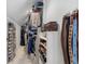 Walk-in closet with shelving for shoes, folded garments, and hanging clothes at 733 Greenview Ne Ave, Atlanta, GA 30305
