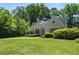 Charming home with a well-manicured lawn and mature landscaping at 733 Greenview Ne Ave, Atlanta, GA 30305