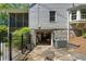 View of the garage with stone accents at the base of the house at 733 Greenview Ne Ave, Atlanta, GA 30305