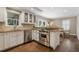 Well-appointed kitchen featuring stainless steel appliances, granite countertops, and hardwood floors at 733 Greenview Ne Ave, Atlanta, GA 30305