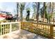 Image features a wood deck with a view of the backyard and surrounding trees at 870 Gaston Sw St, Atlanta, GA 30310