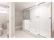 Clean and contemporary bathroom featuring glass shower, white tile, and sleek fixtures at 870 Gaston Sw St, Atlanta, GA 30310