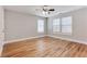 Spacious bedroom features hardwood floors, ample natural light, and neutral walls at 870 Gaston Sw St, Atlanta, GA 30310