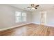 Inviting bedroom with hardwood floors, ample natural light, and ensuite bathroom at 870 Gaston Sw St, Atlanta, GA 30310