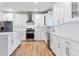 Well-equipped kitchen with stainless appliances, quartz countertops, and white shaker cabinets at 870 Gaston Sw St, Atlanta, GA 30310