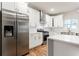Modern kitchen with stainless steel refrigerator and modern appliances at 870 Gaston Sw St, Atlanta, GA 30310